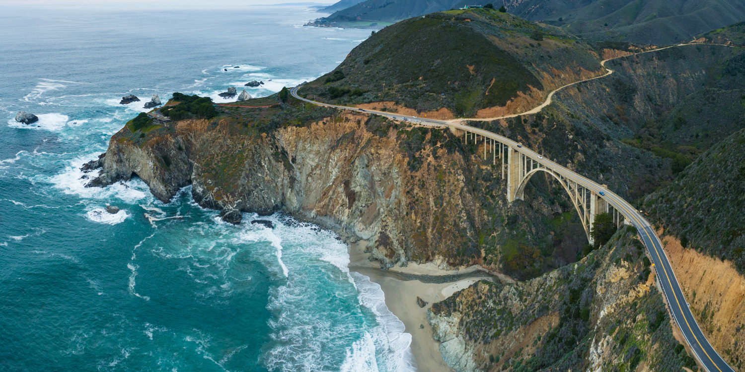 Drone view of Bixby Bridge and the Big Sur coast.