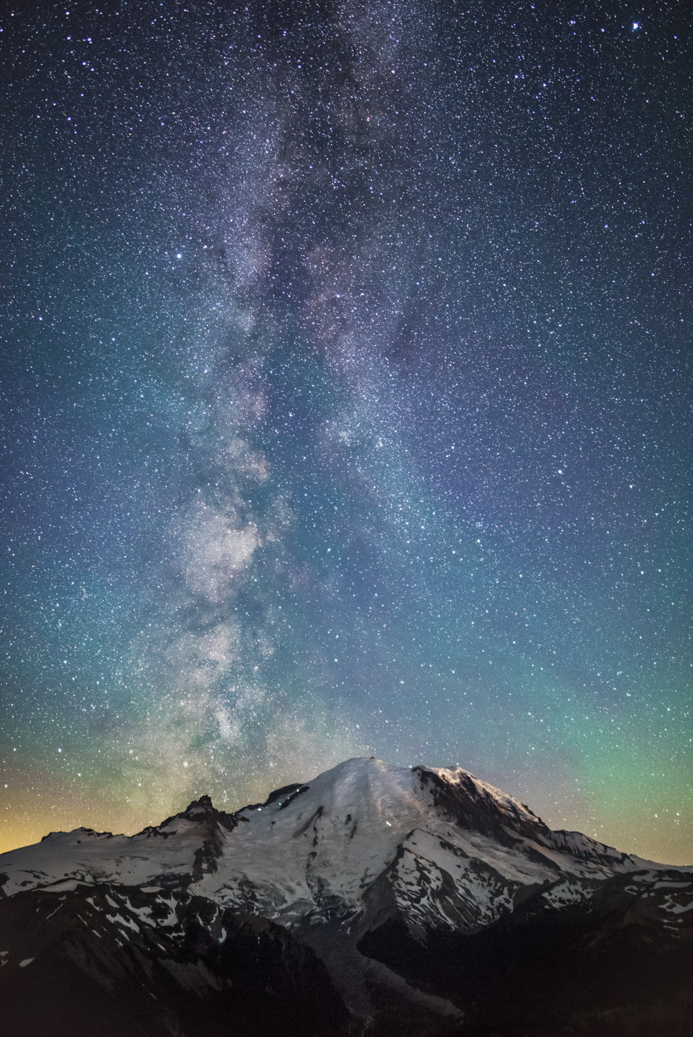 The Milky Way Galaxy above Mount Rainier in Mount Rainier National Park.