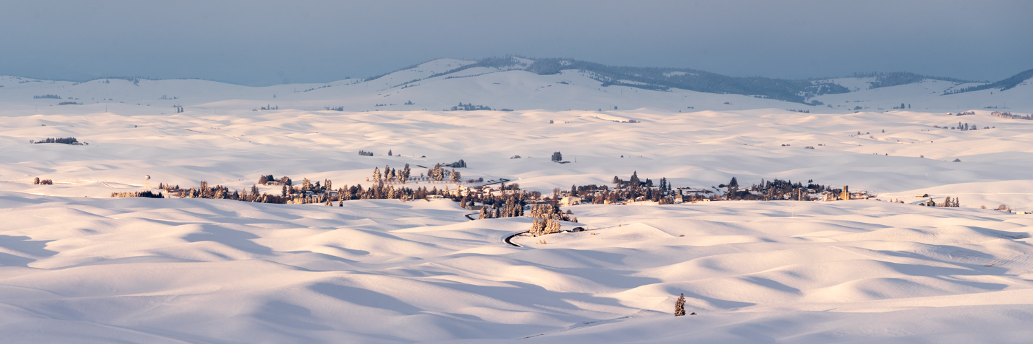 A panorama of Oakesdale, Washington covered in snow in winter.